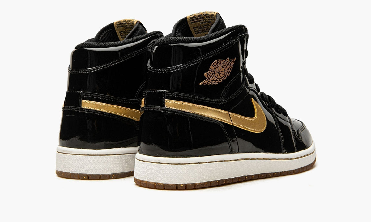 Air Jordan 1 Retro High OG "Black/Metallic Gold" Sneakers